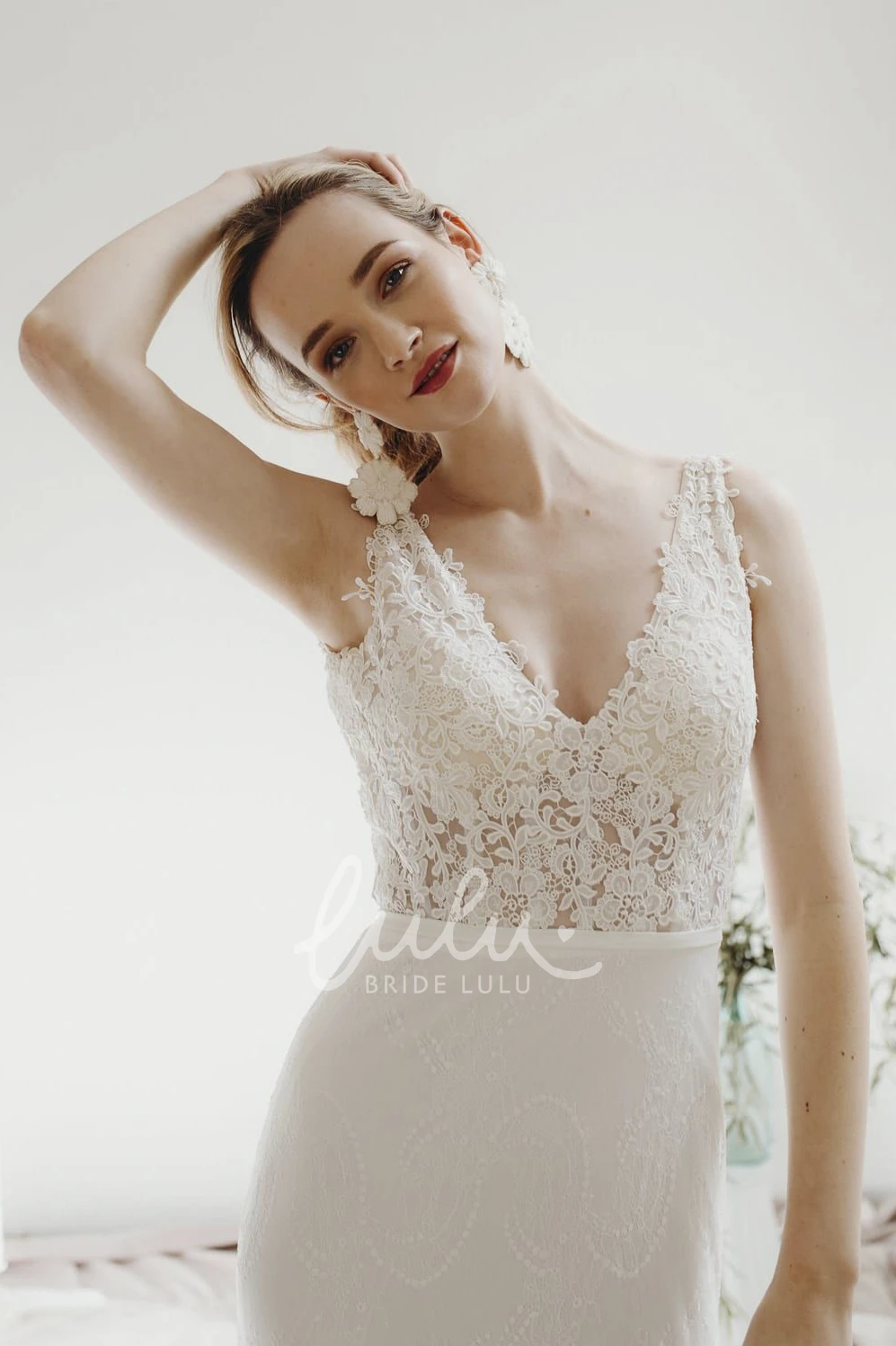 Sleeveless Lace Sheath Wedding Dress with Plunging V-neck and Deep V-back Buttons