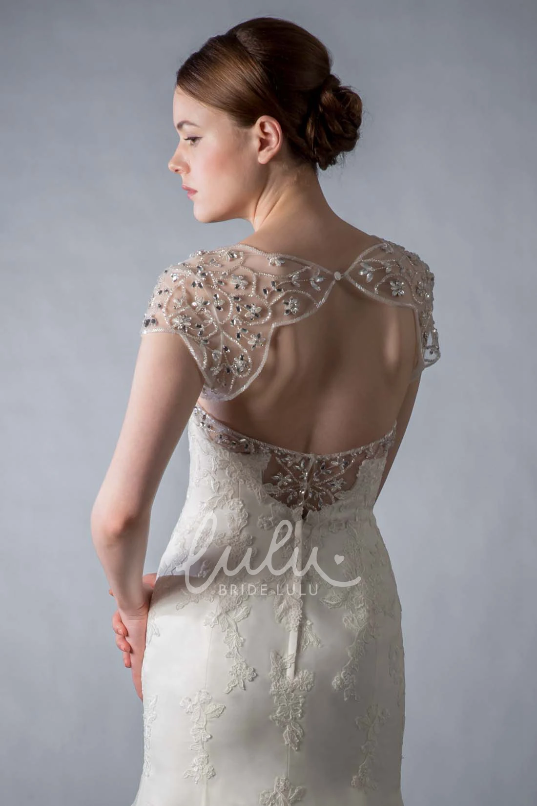 Beaded Lace Mermaid Wedding Dress with Cap Sleeves and Keyhole Elegant Bridal Gown
