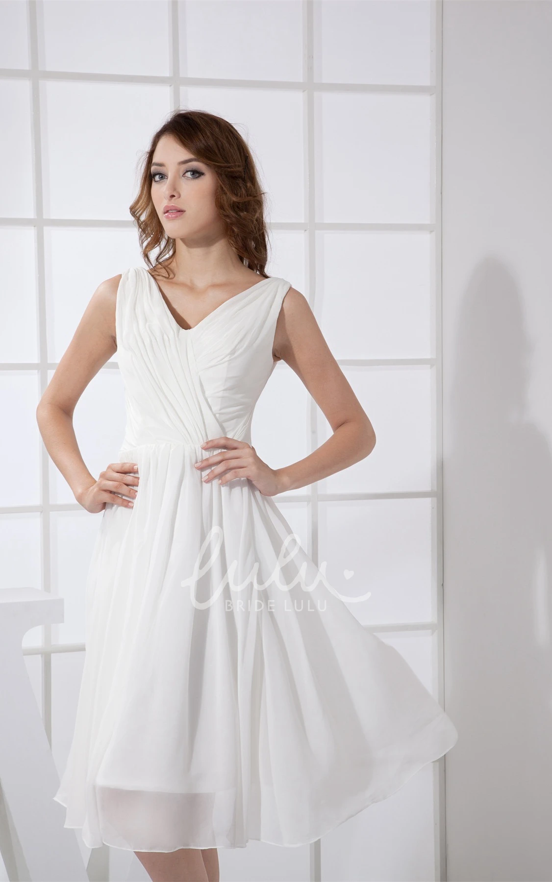 Knee-Length Pleated Dress with Ruching Chic & Flattering