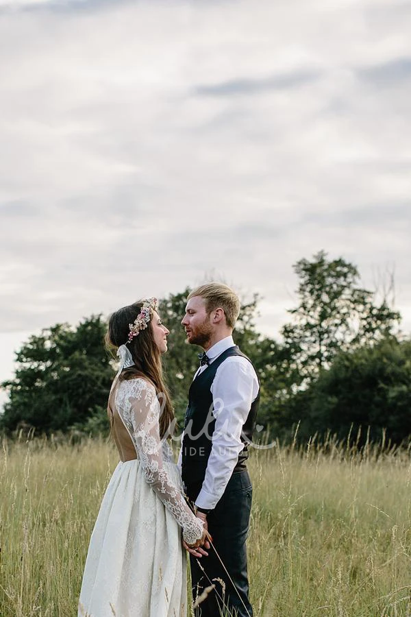 Lace Open Back Halter Wedding Dress with Long Sleeves