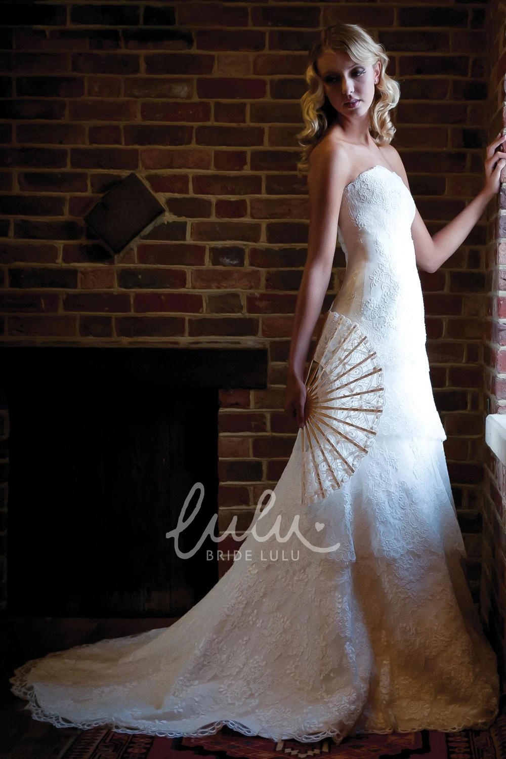 A-Line Lace Wedding Dress with Tiers and Sleeveless Design