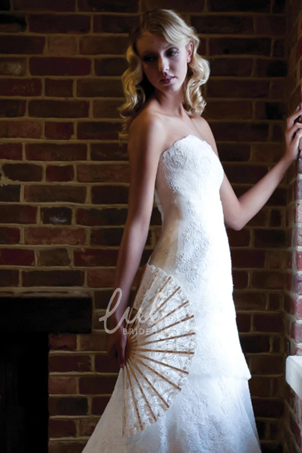 A-Line Lace Wedding Dress with Tiers and Sleeveless Design
