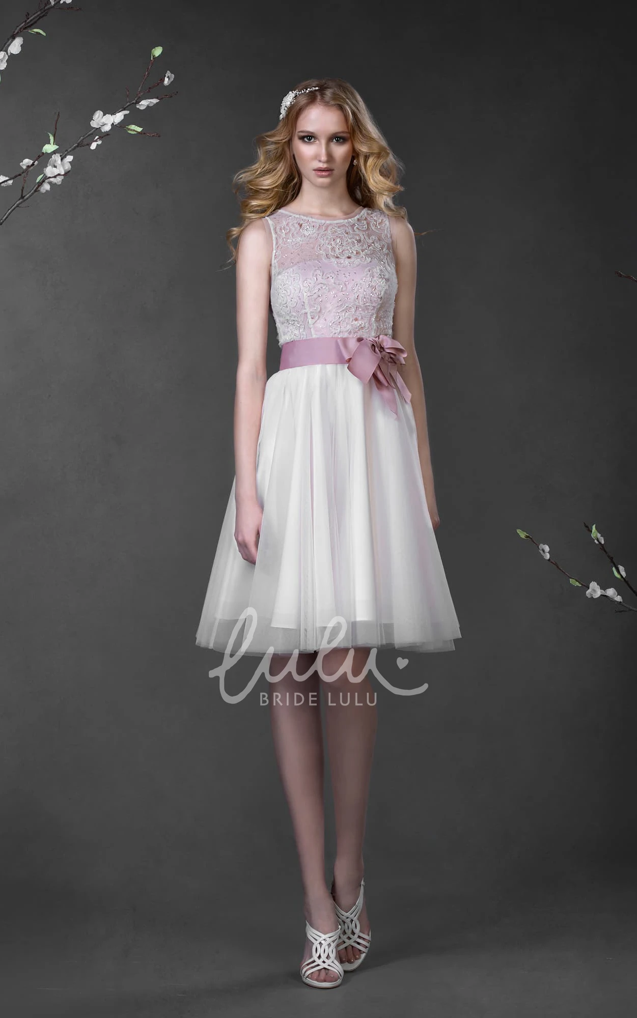 Lace Tulle A-Line Spring Wedding Dress with Low-V-Back Bow and Sleeveless Design