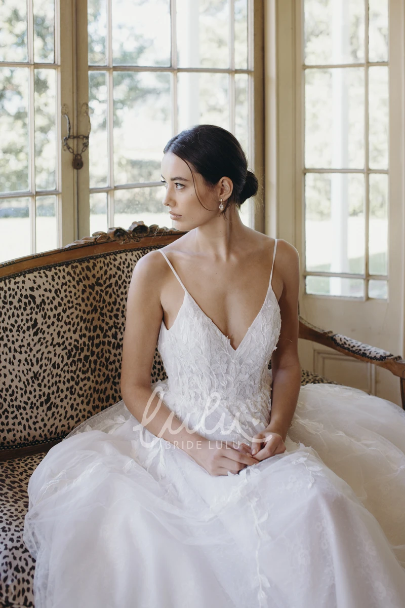 Ethereal Lace Applique Tulle Wedding Dress with Plunging V-neck and Spaghetti Straps
