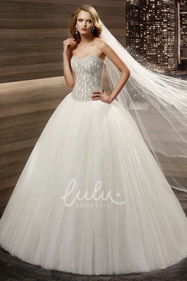 Sequined Sweetheart Wedding Dress with Fine Corset and Puffy Skirt