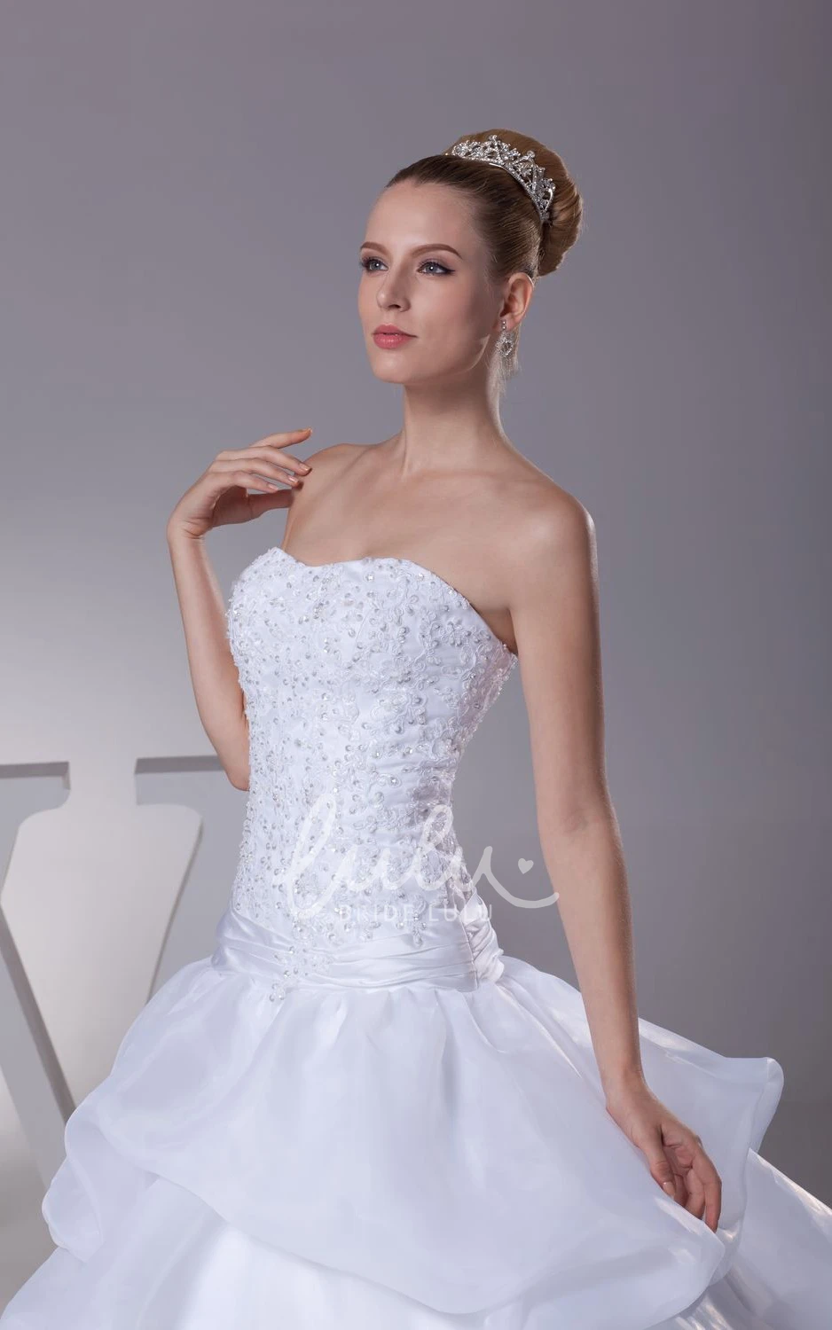 Appliqued A-Line Organza Wedding Dress With Pick-Up Design and Strapless Neckline