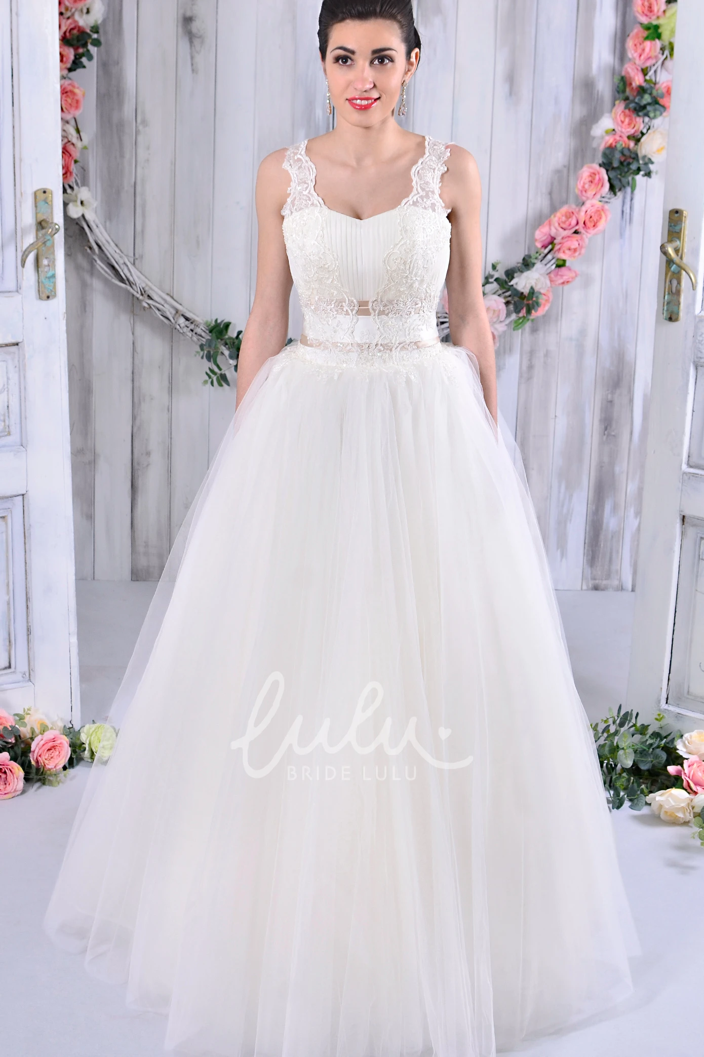 Sleeveless Lace and Tulle Ball Gown Wedding Dress with Bow Detail