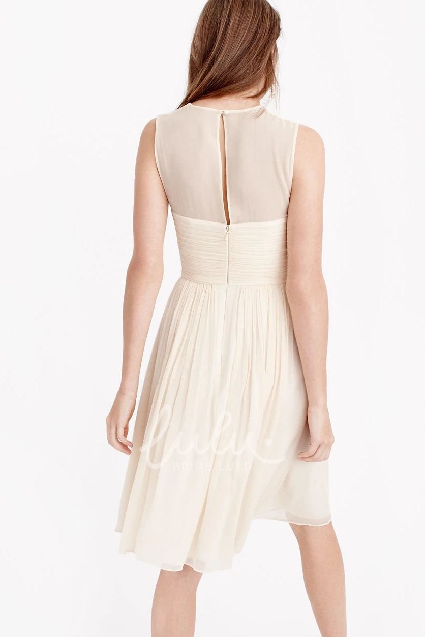Sleeveless Knee-Length Chiffon Bridesmaid Dress with Criss-Cross Neckline