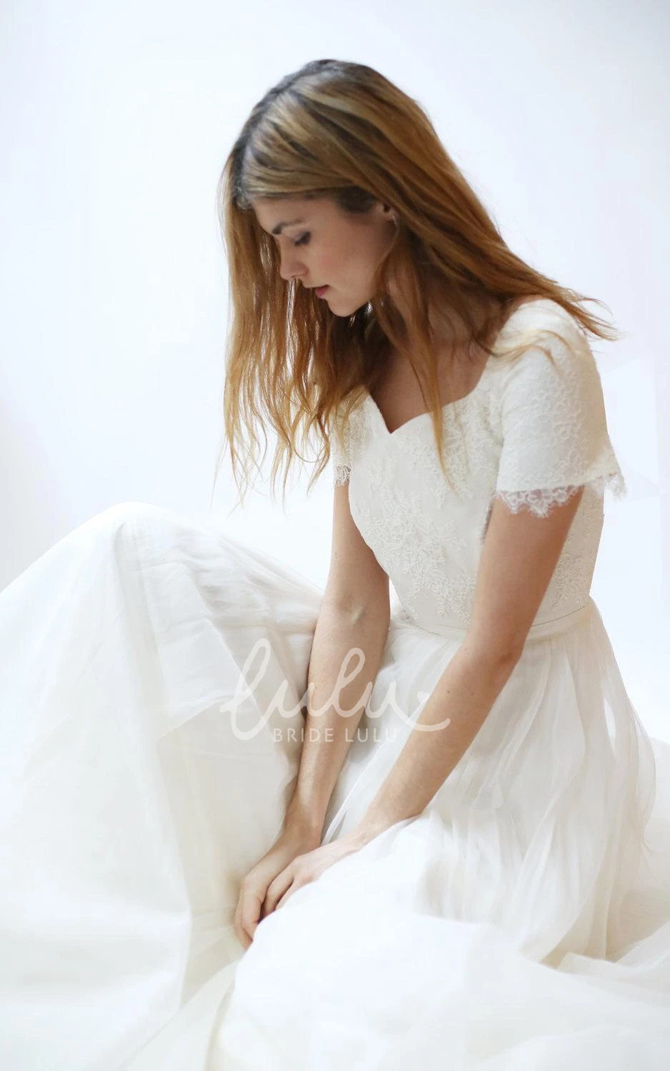 A-Line Tulle Wedding Dress with Lace Bodice and Short Sleeves