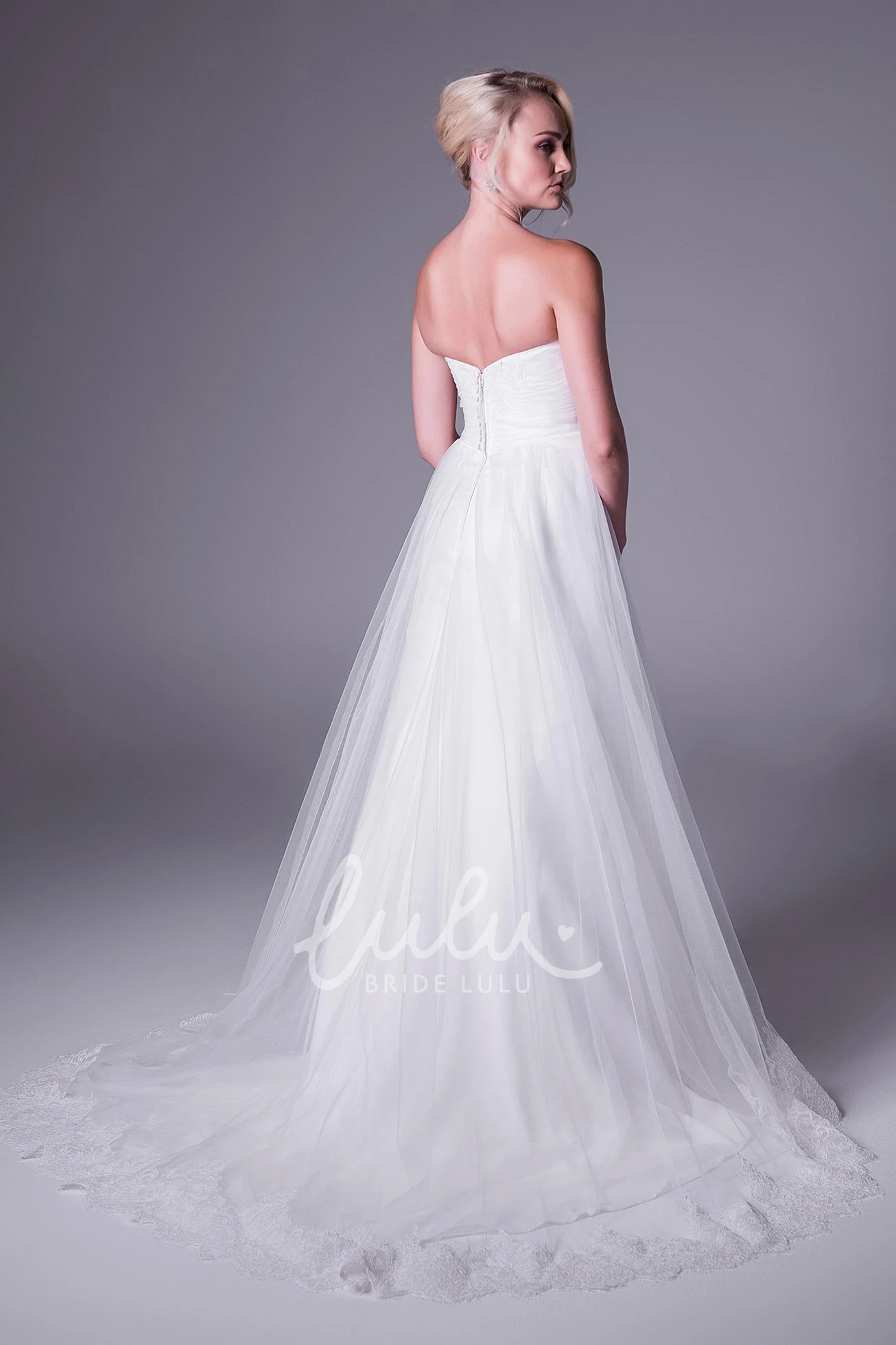 Sweetheart Tulle A-Line Wedding Dress with Appliques and V Back Floor-Length