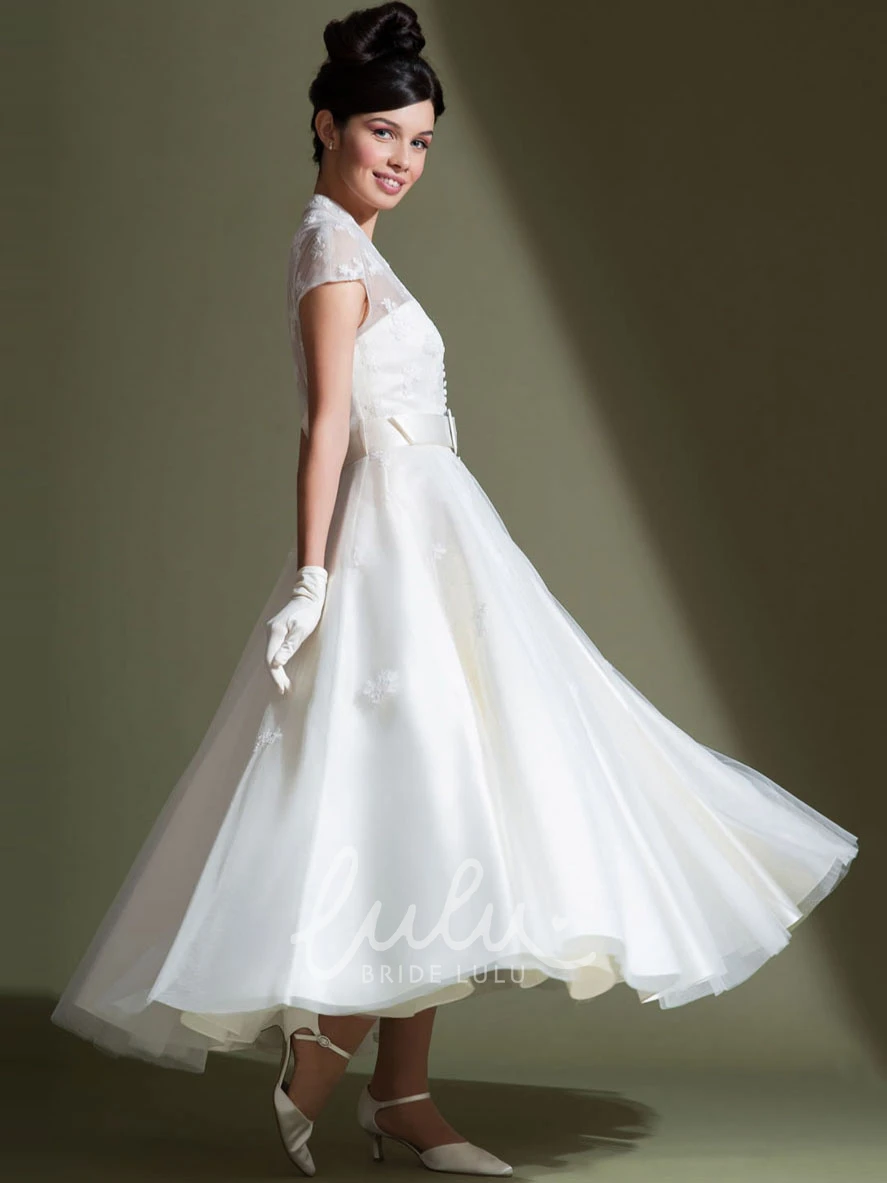 A-Line Tulle Cap Sleeve Wedding Dress with Appliques and V-Neck