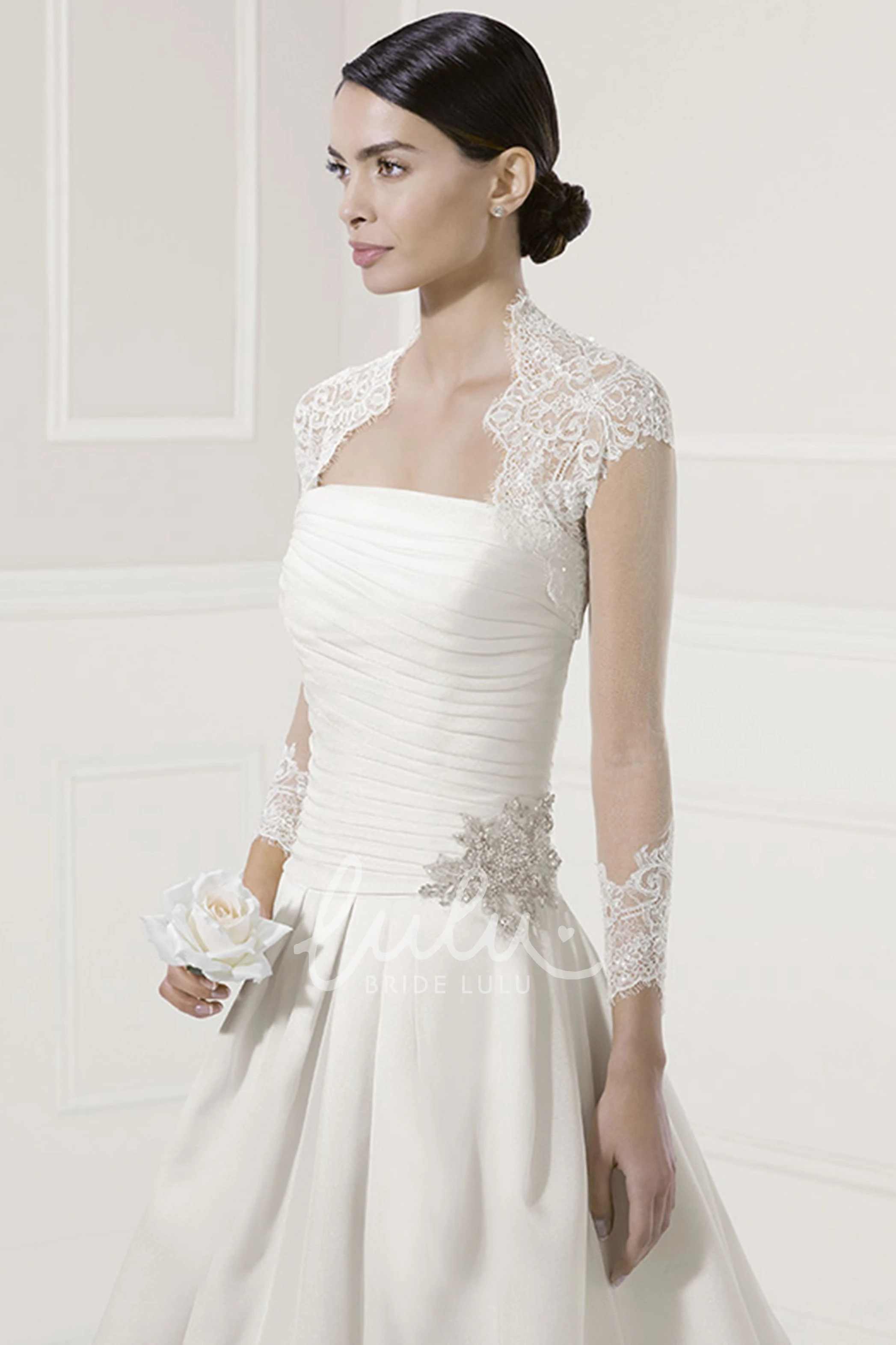 A-Line Strapless Bridal Gown with Ruched Bodice and Lace Jacket