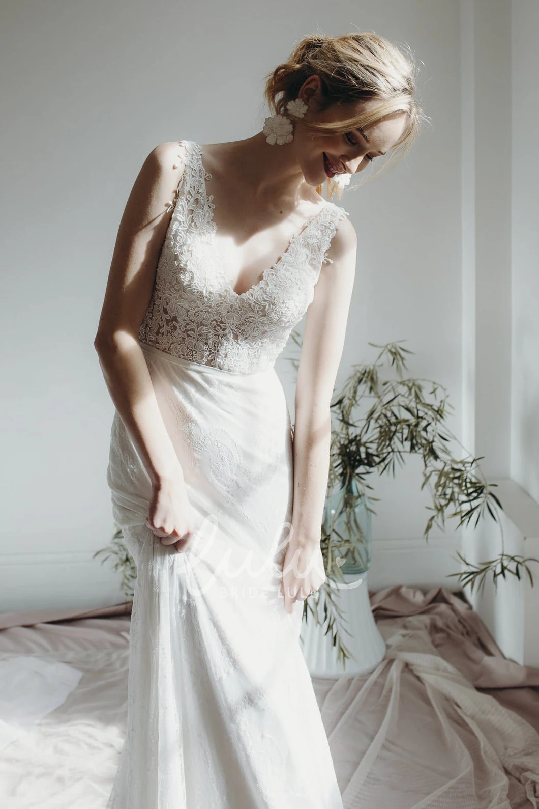 Sleeveless Lace Sheath Wedding Dress with Plunging V-neck and Deep V-back Buttons