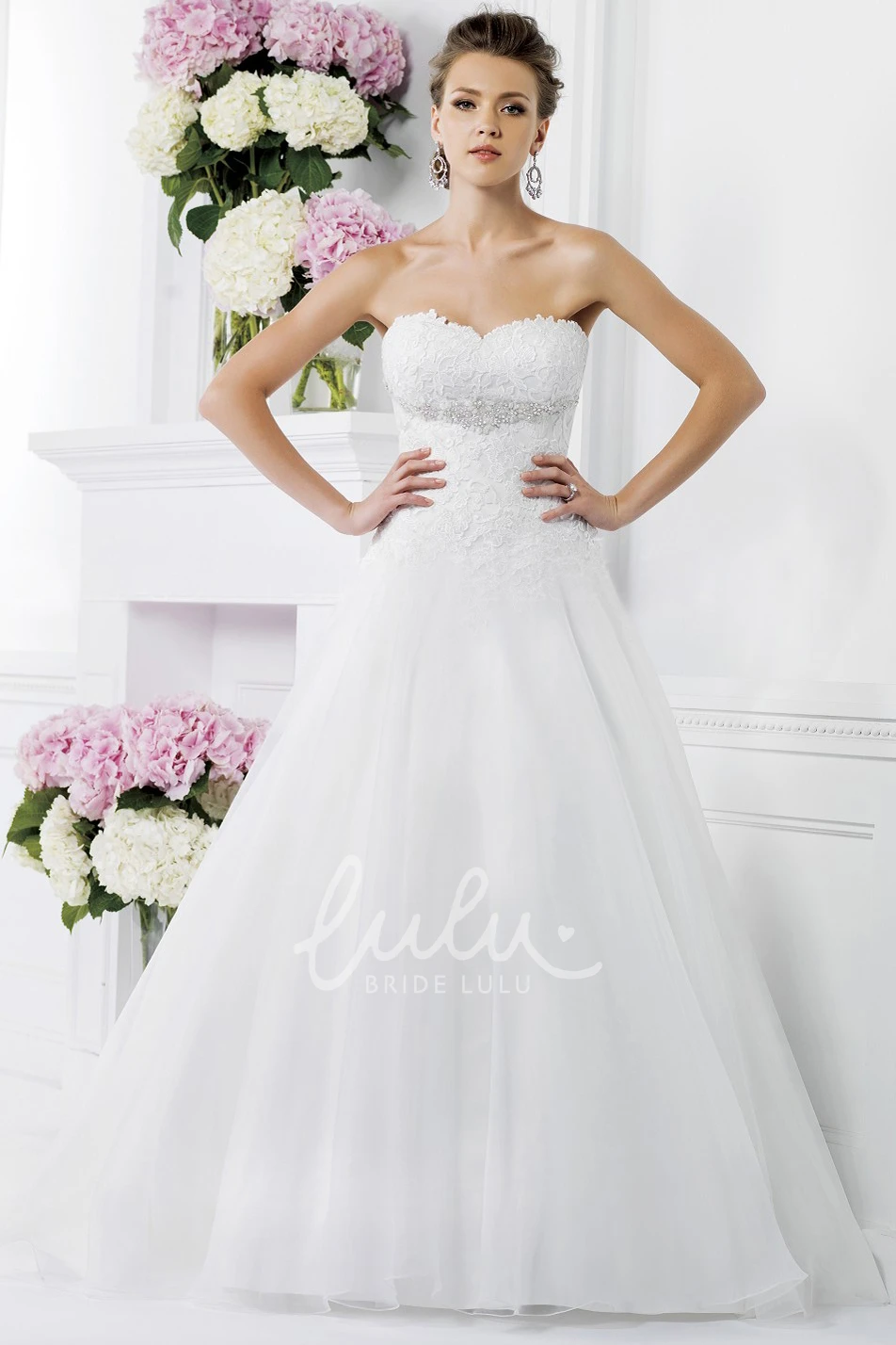 A-Line Lace Wedding Dress with Sweetheart Neckline and Beadings
