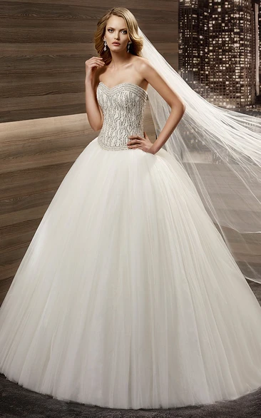 Sequined Sweetheart Wedding Dress with Fine Corset and Puffy Skirt