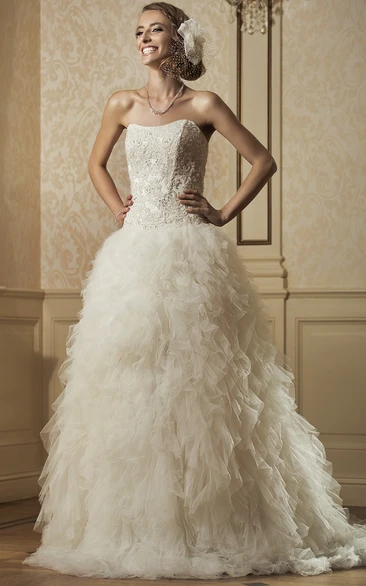 Beaded and Appliqued Ball Gown Wedding Dress with Strapless Ruffles and Tulle