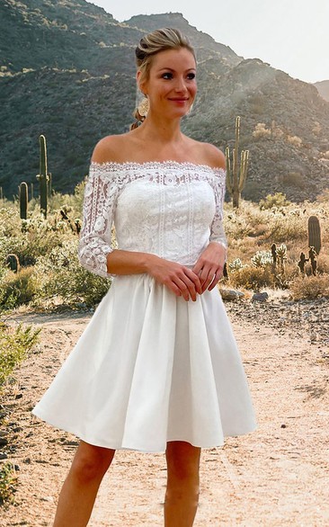 White dress below top knee length