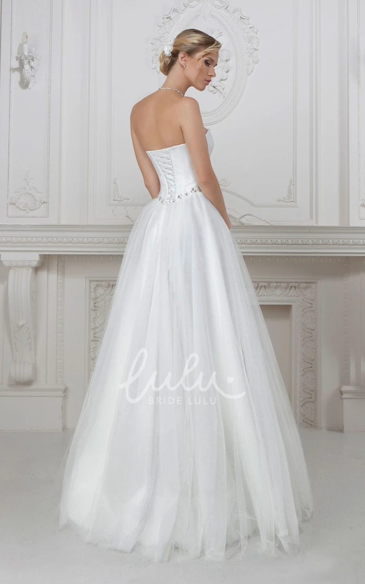 A-Line Sleeveless Tulle Wedding Dress with Ruching and Beaded Bodice Strapless