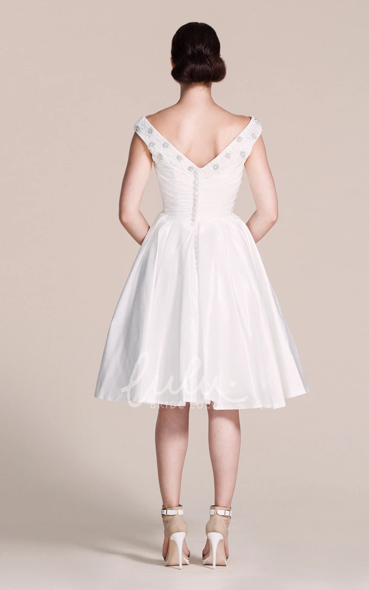 Cap-sleeved A-line Wedding Dress With Pleats and Beadings V-neck