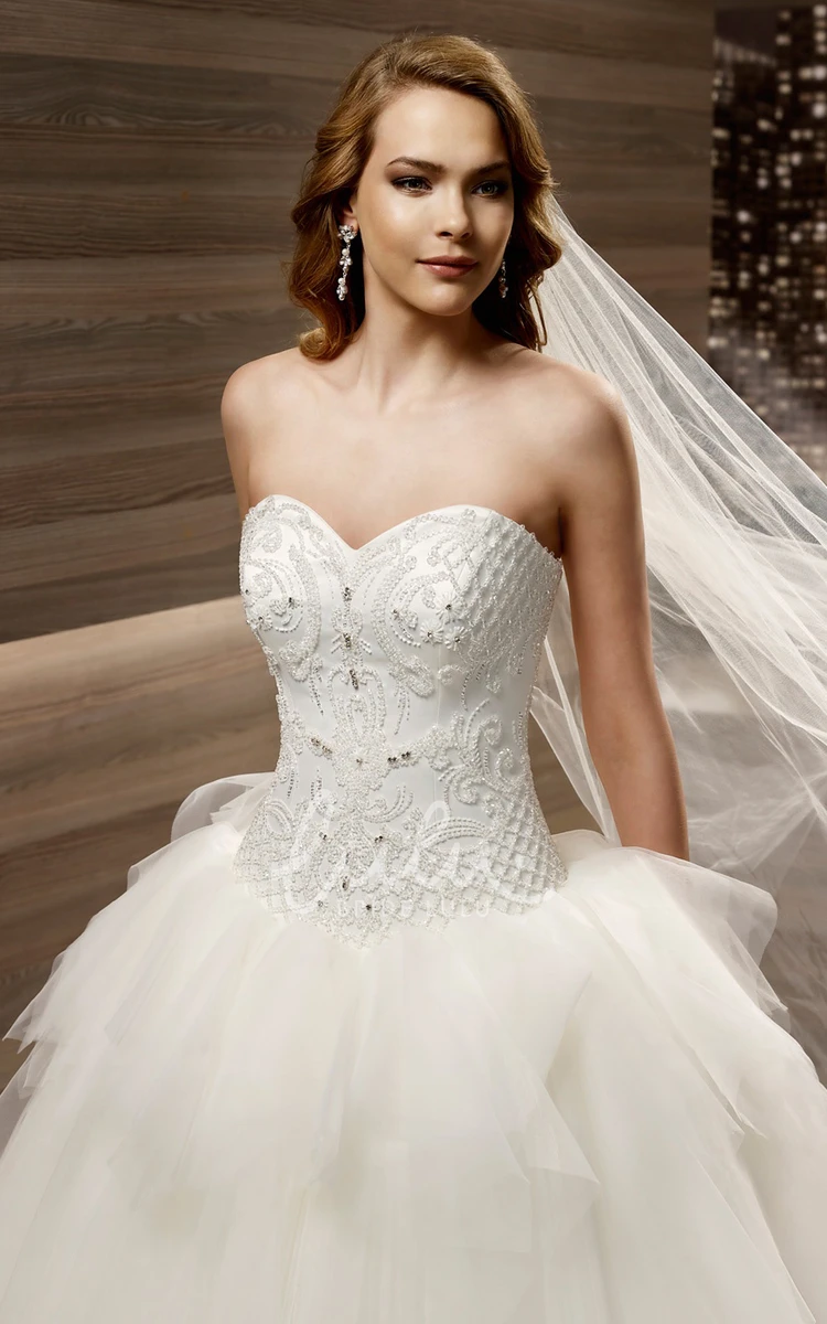 Asymmetrical Peplum Sweetheart A-line Wedding Dress with Applique Bodice