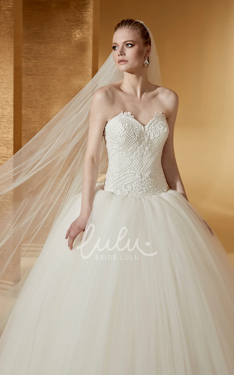 Sleeveless Ball Gown with Embroideries and Open Back Elegant and Modern