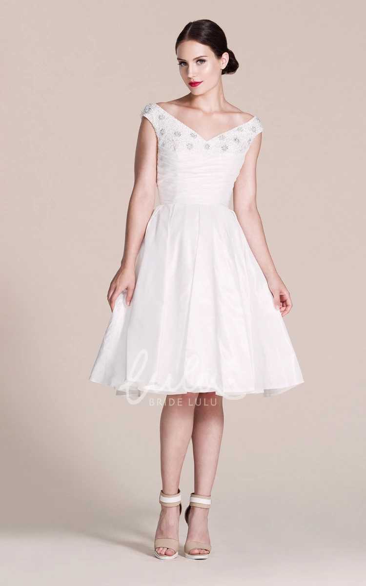 Cap-sleeved A-line Wedding Dress With Pleats and Beadings V-neck