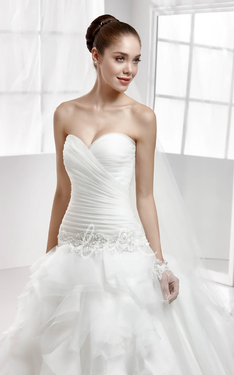 Beaded Wedding Dress with Cascading Ruffles and Pleated Bodice